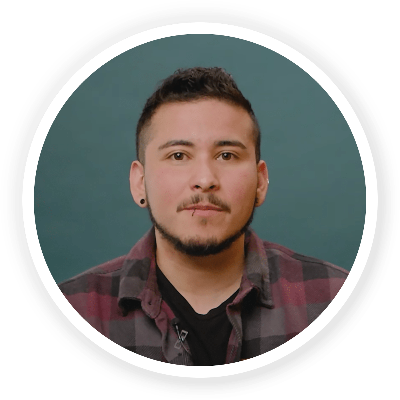 Profile of Alex Jimenez in a red checkered shirt on a dark blue-green background